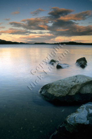 Scotland Loch Lomond sky cloud lake water rock calm peaceful
