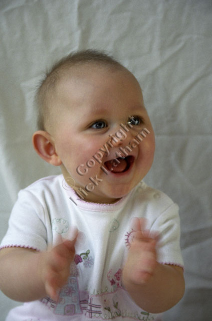 child baby portrait clap smile girl